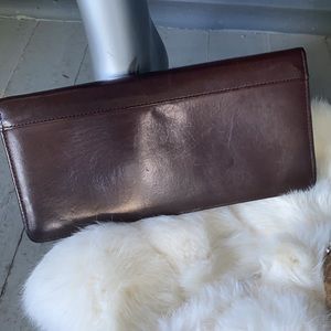 COACH chestnut brown leather bi-fold wallet
